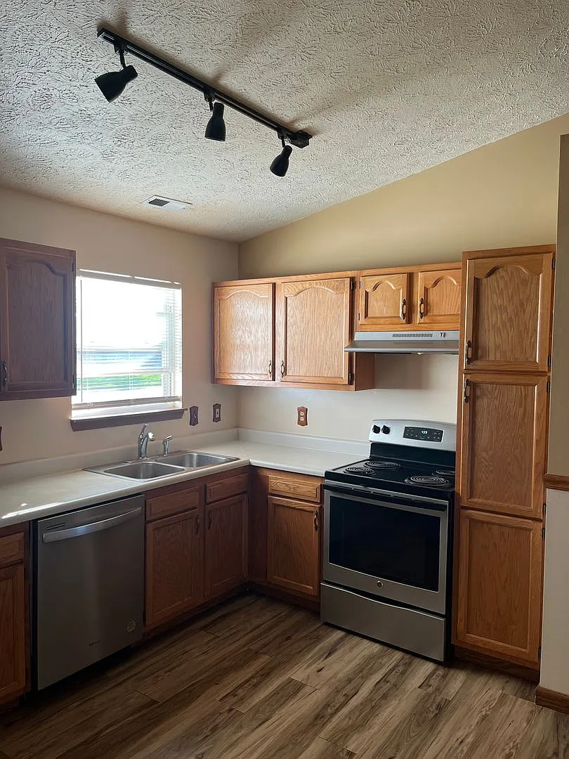 Inviting Saddlebrook Home with Open Floor Plan & 2-Car Garage — Photo 2