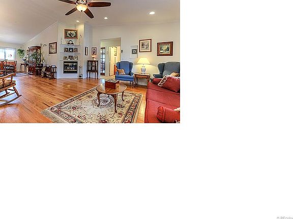 High Ceilings in Living/Dining.  Fireplaces (in living and family room downstairs) with blower and thermostat.