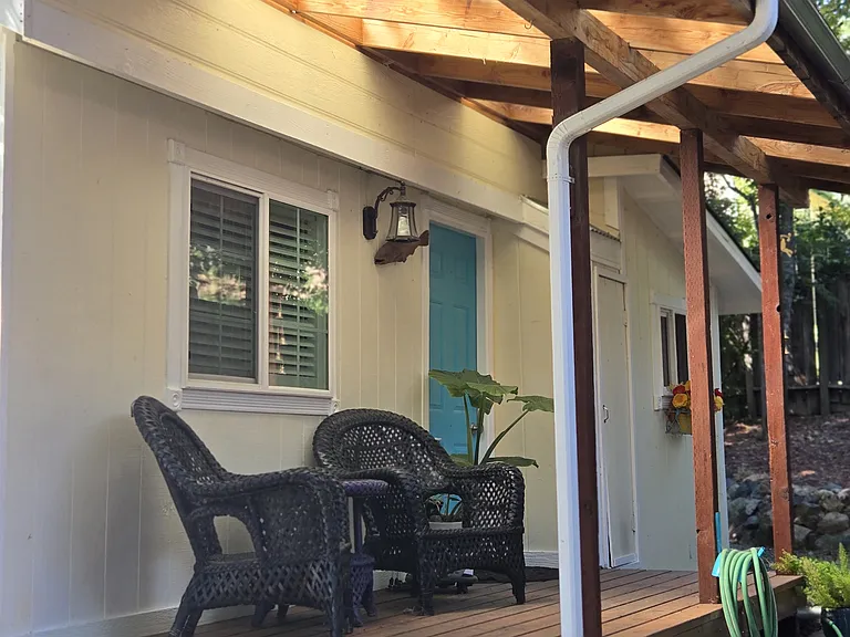 custom porch new roof has light panels