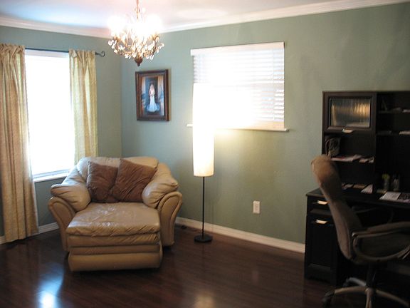 Brand new wood floors thoughout living area, hall, den and guest bedroom.