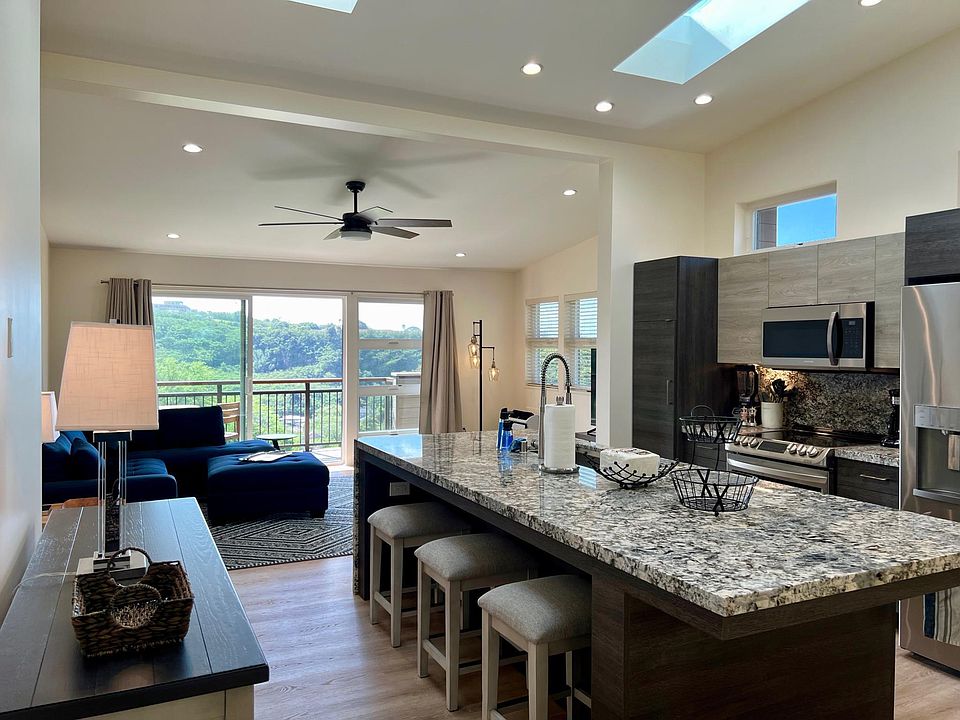 Upper Floor Living Area, Dining, Kitchen and large screen smart TV viewing.