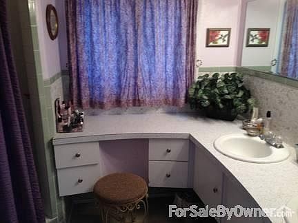 Comfortable living room to entertain in.
						:
						Enjoy the living room with family and friends as you entertain!