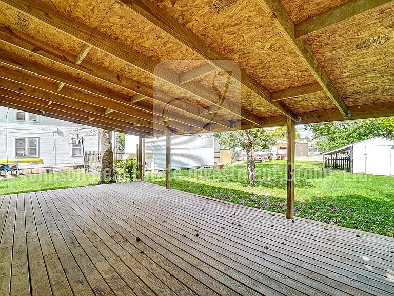 Absolutely huge covered deck _ a great place to relax outdoors.