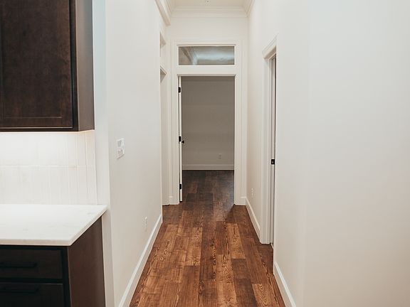 Hallway to bedrooms and bathrooms.