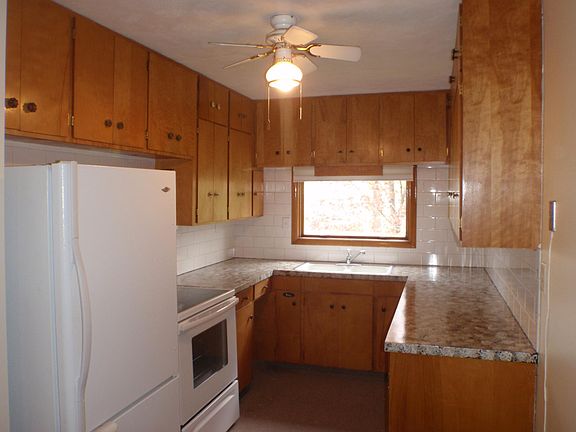 Kitchen with ample storage and new backsplash