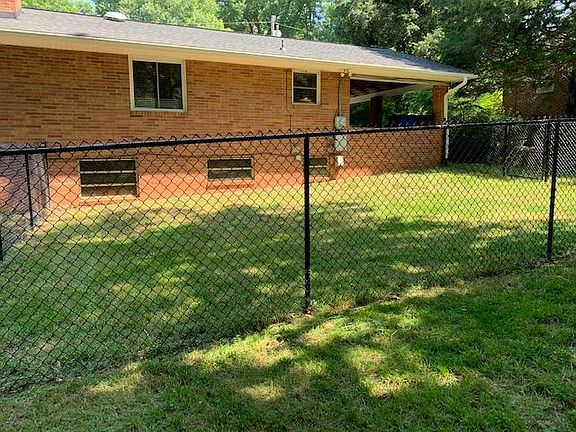 Fenced-in area in backyard