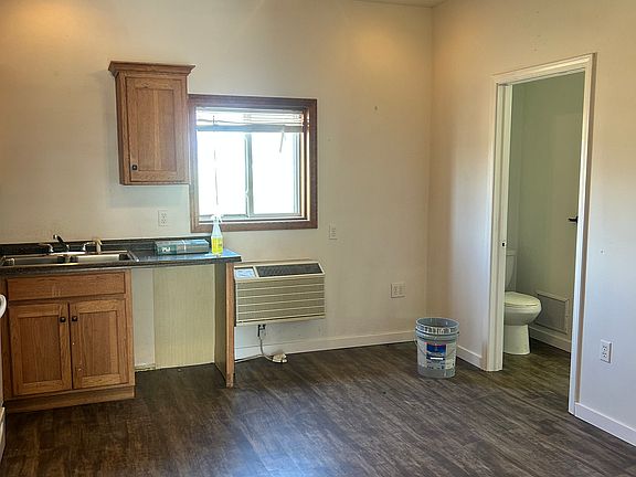 Kitchen open concept with new flooring, very spacious .