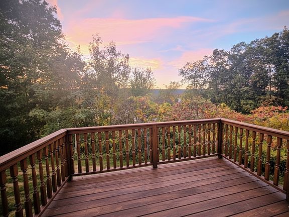 Spacious private deck for morning coffee or weekend lounging.