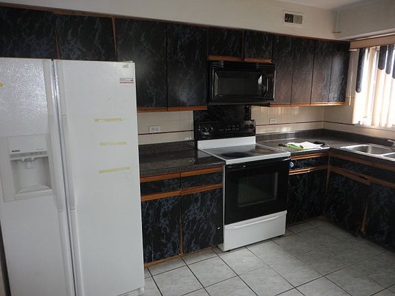 4th image of 9407 Bay Colony Dr APT 1E