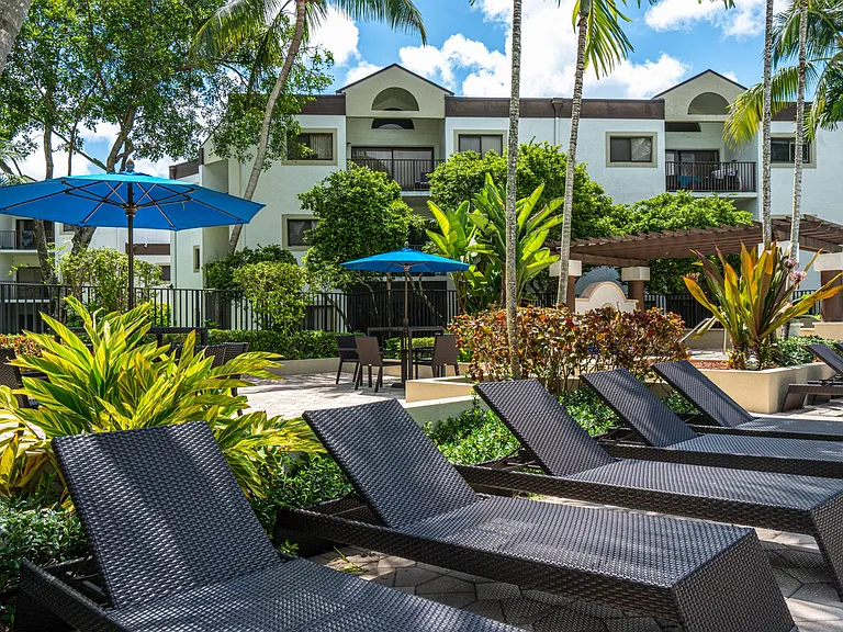 Expansive pool deck with lounges