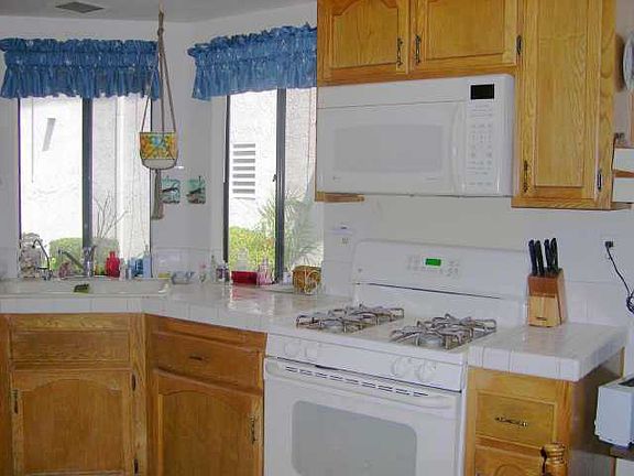 Kitchen, white tile and oak