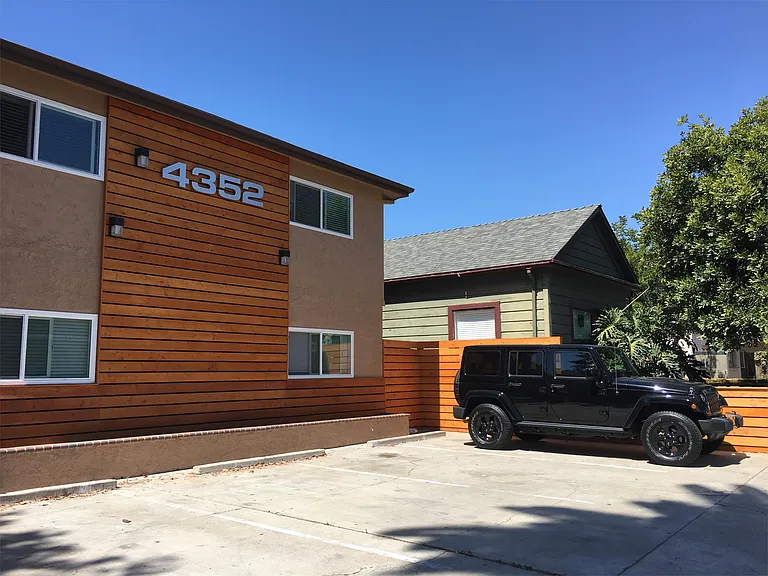 Front of building with secured lock ,both front and back gates