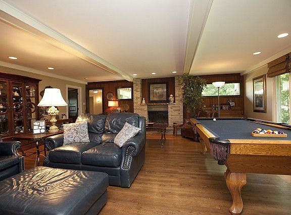 Great room fireplace and hardwood floors