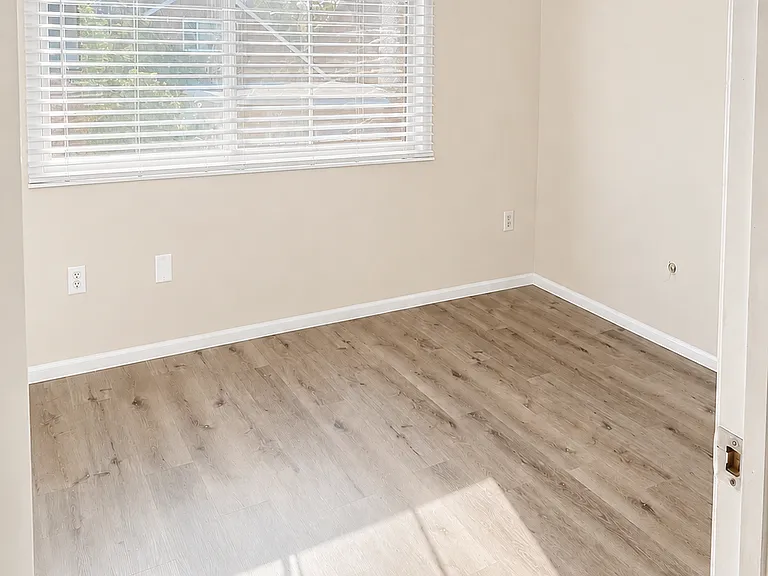 master bedroom with vaulted ceilings