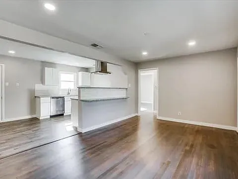 Spacious living room open concept with kitchen view