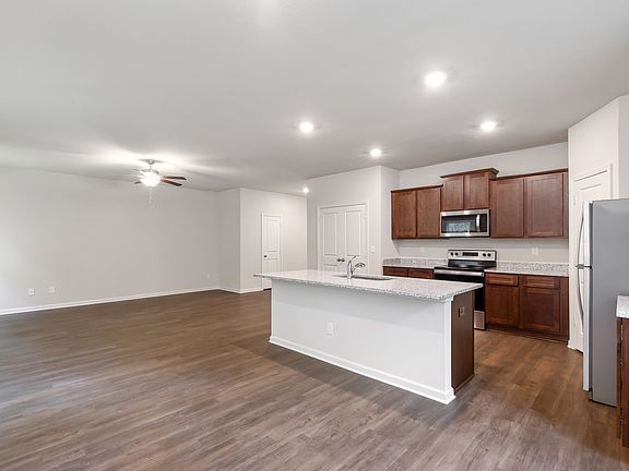 This move-in ready home features gorgeous granite countertops in the kitchen