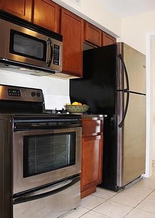 Beautifully updated kitchen with stainless steel appliances and granite counter tops!