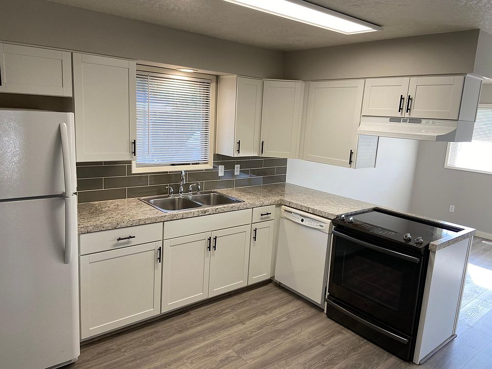 New kitchen cabinets, counter top appliances and laminate flooring.