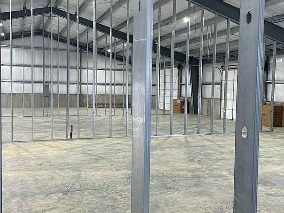 Metal studs removable to accommodate an open floor plan.