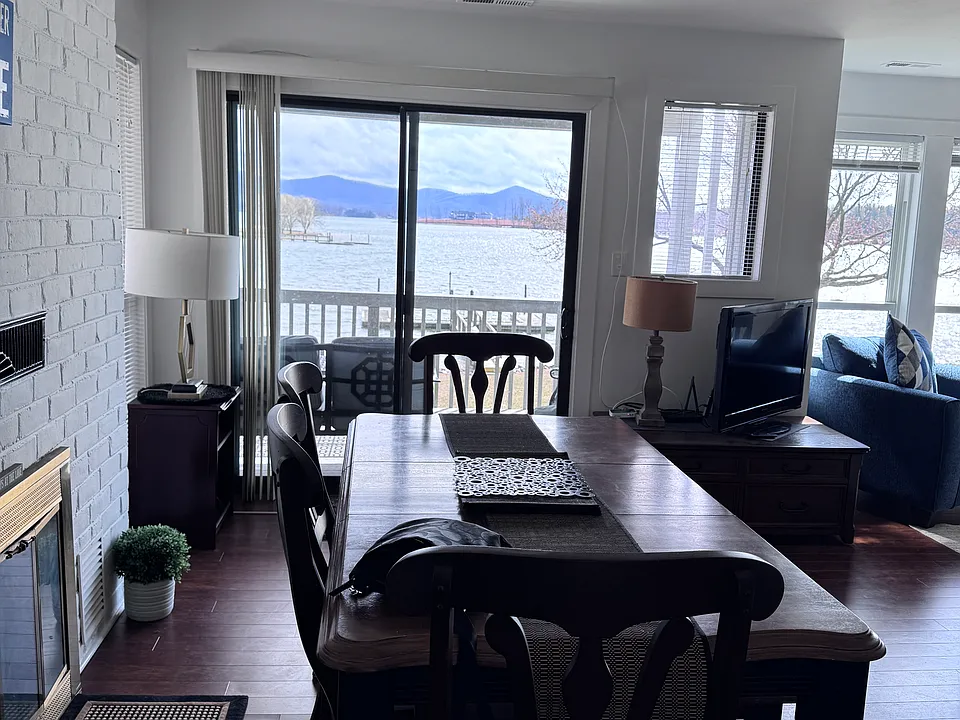 Enter The Townhouse to a Stunning Mountain & Lake View w/ Generous Dining Area & Front Hall Storage Closet