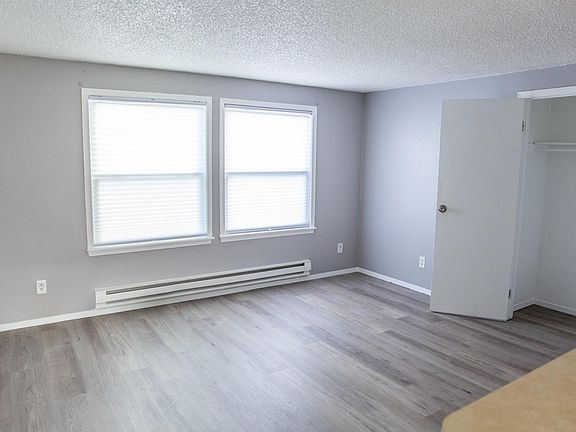 Huge family room with 2 big windows. Lots of natural light