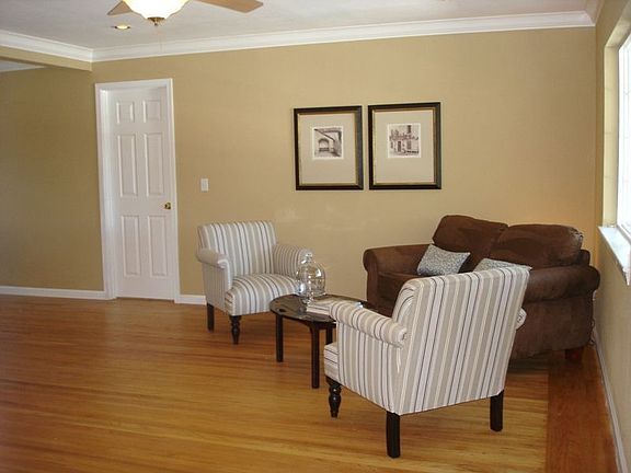Oversized living room with original hardwood floors