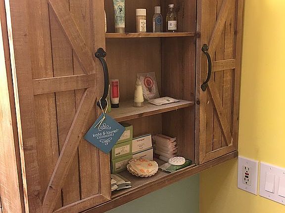Barn door medicine cabinet