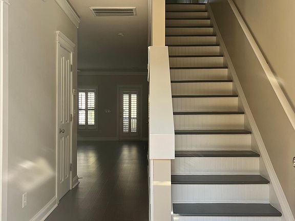 Standing in the front door