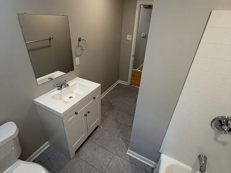 Hall bathroom with shower & bathtub