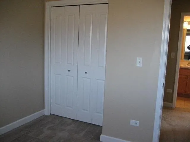 Bedroom 3 Closet and Hallway to Upstairs Bathroom