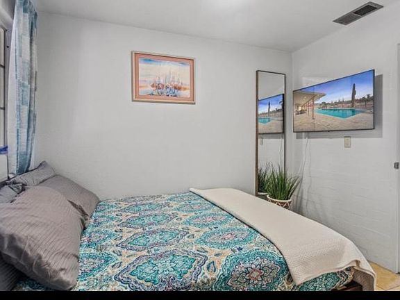 2nd bedroom has a new Queen mattress, 43" smart TV, it's own bathroom, and closet.