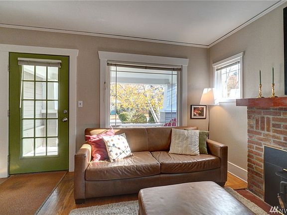 This delightful living room has a comfortable sitting area. 