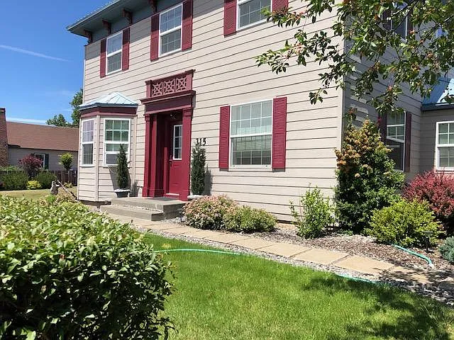 Side yard - 315 W Broadway St