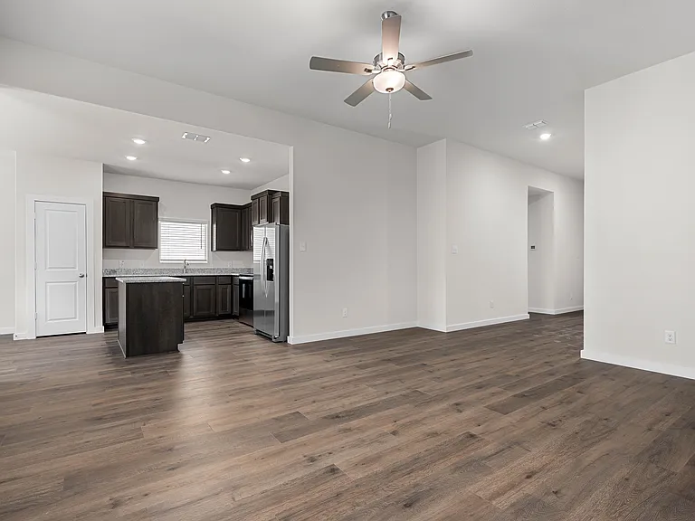The living room sits right off of the kitchen.