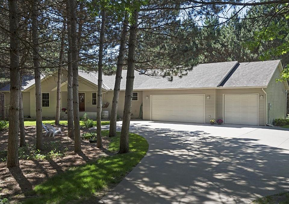 Surrounded by towering pines, green-space, and privacy galore!