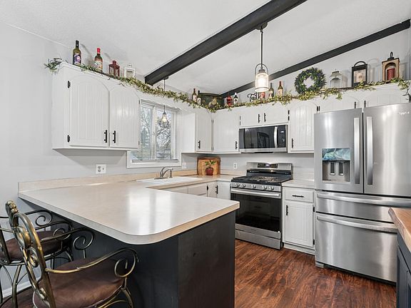 5th image of 8219 Queen Ave N