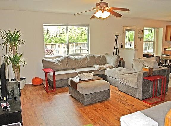 Living room features tons of natural light.