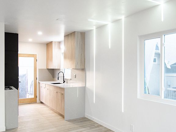 Custom embedded in wall lighting.