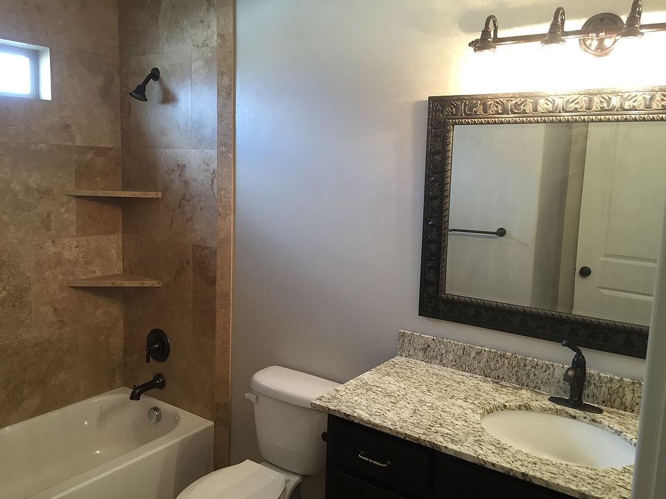 Bathroom w/ Travertine