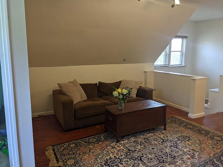 Third floor living space couch area