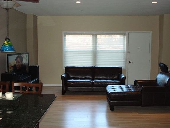 Living Room w/ ent. to front of building