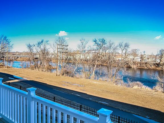 Deck attached to kitchen with Waterview's
