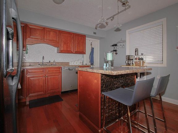 Door leads to laundry room.