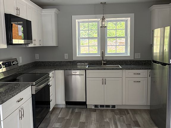All new everything in the kitchen! Cabinets, stainless appliances, granite countertops