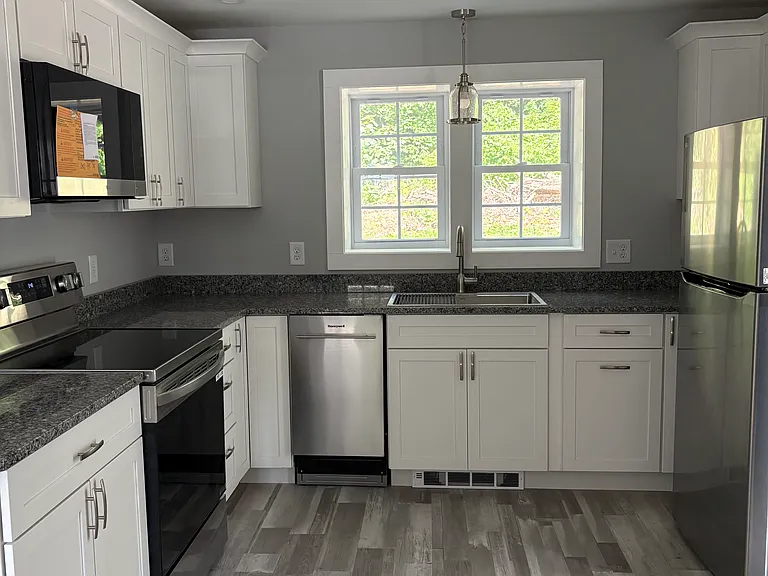 All new everything in the kitchen! Cabinets, stainless appliances, granite countertops