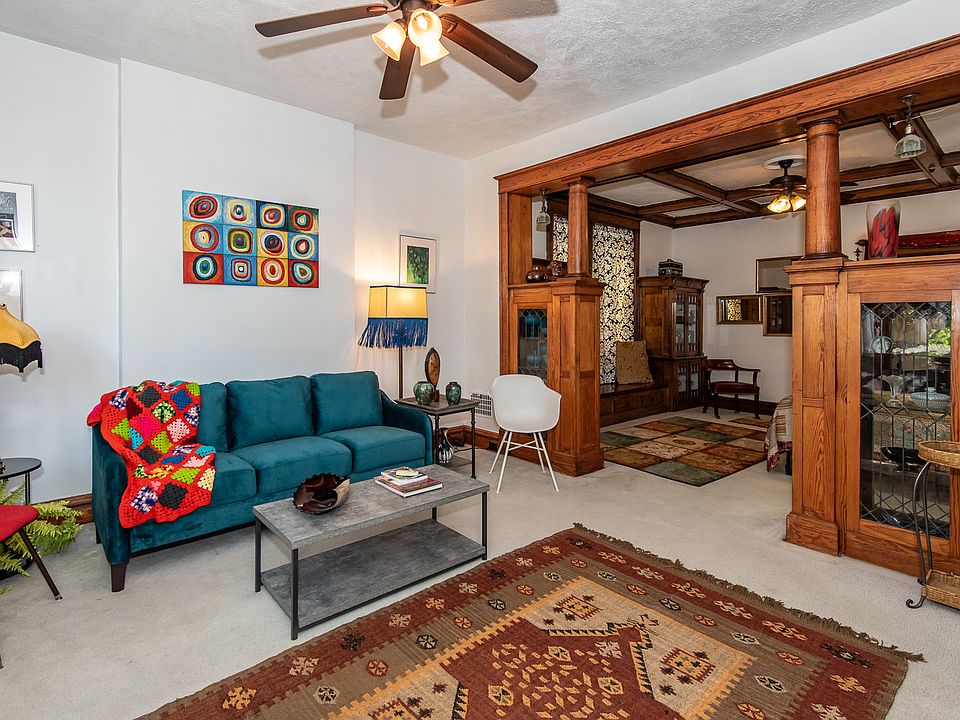 Original built-ins to this Mission building. Cabinets with leaded glass, colonnades coffered ceiling.