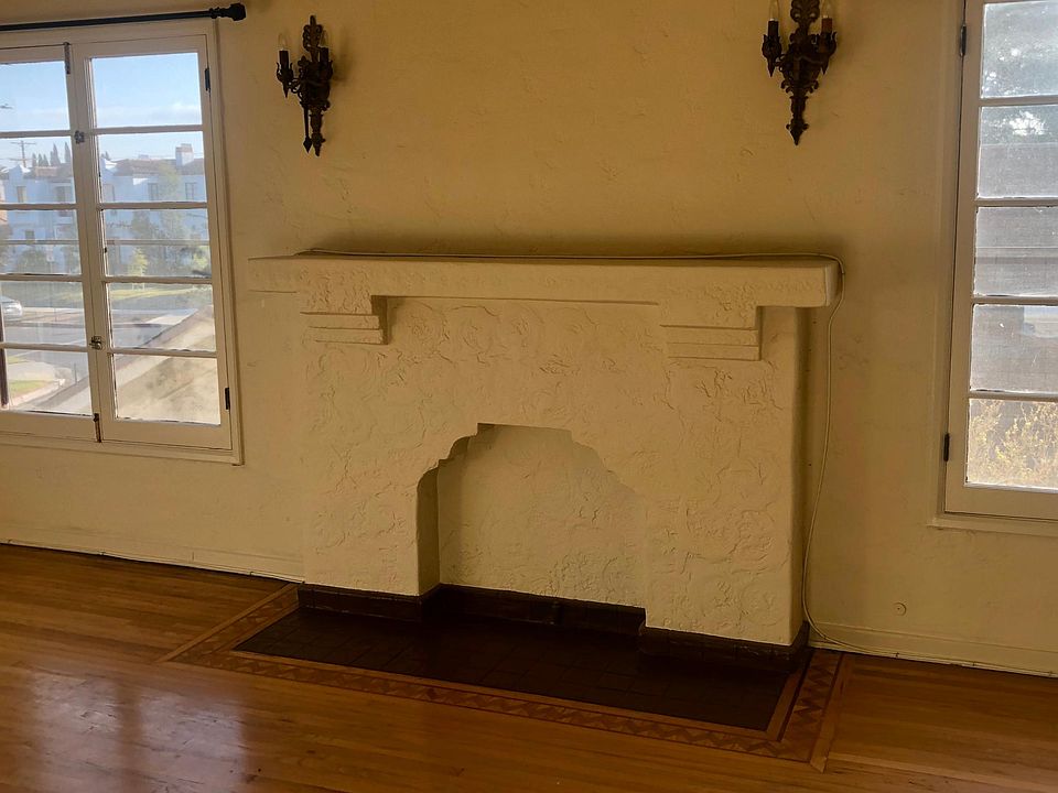 Living room with decorative fireplace