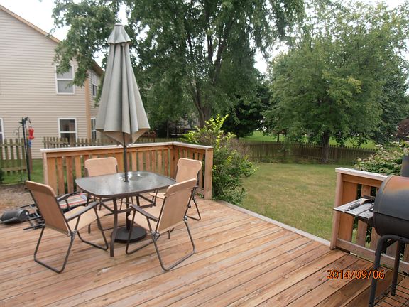 deck overlooking fenced yard