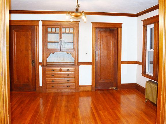 Dining Room (Looking from Living Room). The right swing door open to pantry and kitchen.