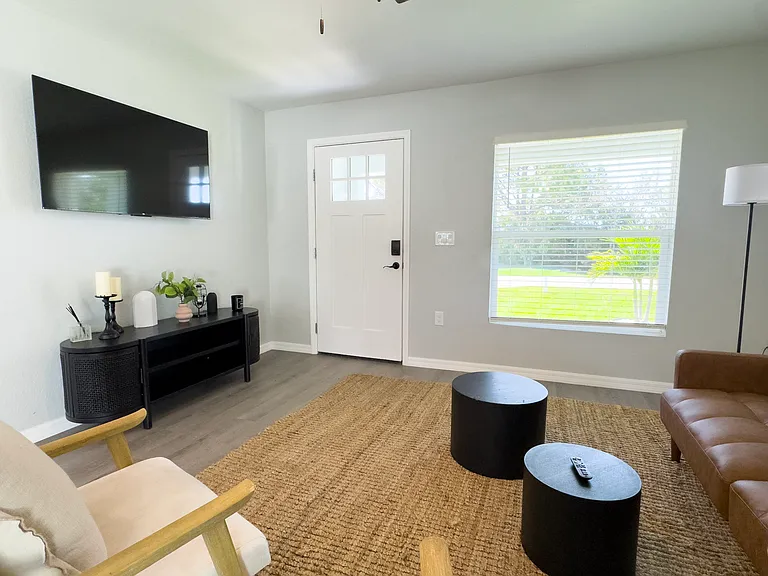 Bright living room with an open-concept design, perfect for relaxing or entertaining.